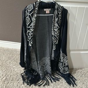 Black and beige fringed sweater